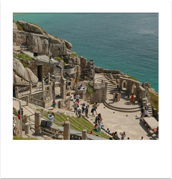 The open-air Minack Theatre carved into the granite cliffs above the sea in Cornwall.