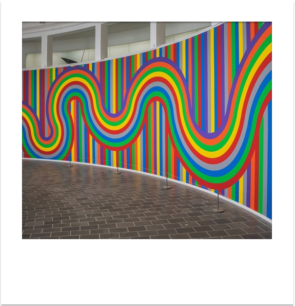 Colourful curved wall mural on display at the Tate St Ives.